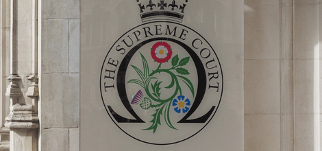 The supreme court logo on building